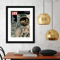 The Art Group To The Moon Framed Print